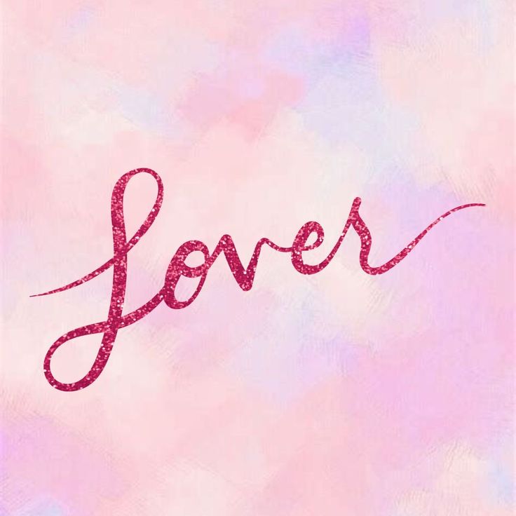 the word lover written in pink and purple ink on a pastel watercolor background