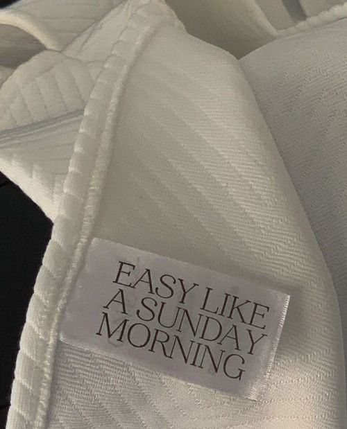 a label on a white shirt that says easy like a sunday morning