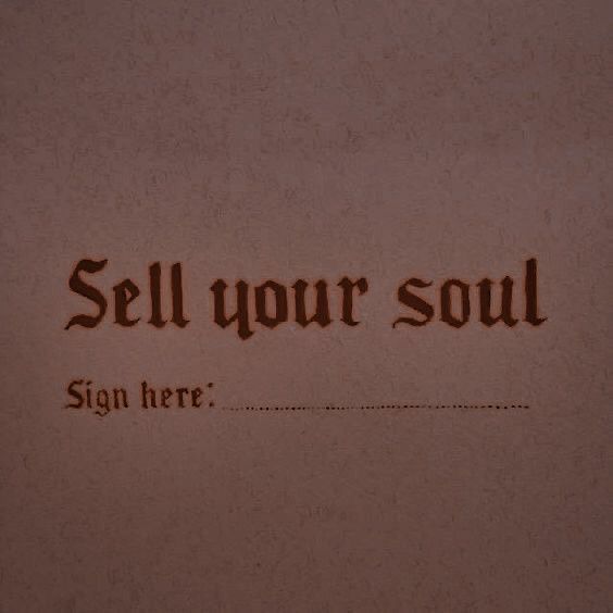 a sign that says sell your soul on it