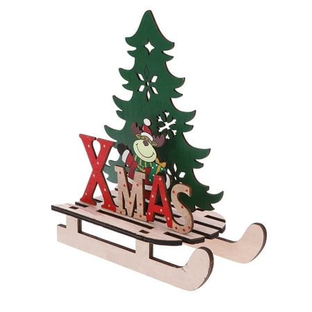 a wooden sleigh with a christmas tree on it and the word xmas spelled in red