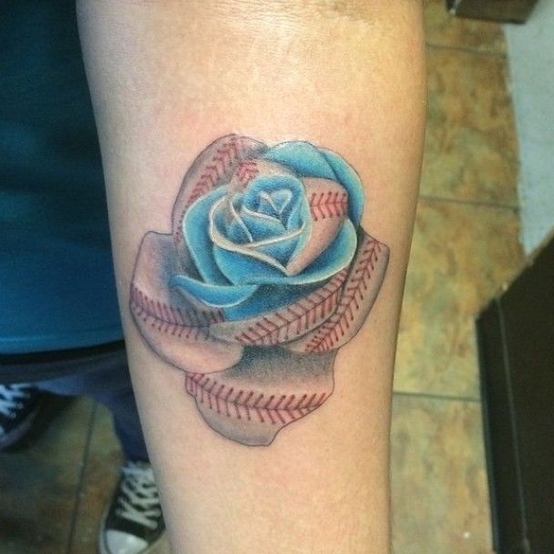 a baseball tattoo with a blue rose on it