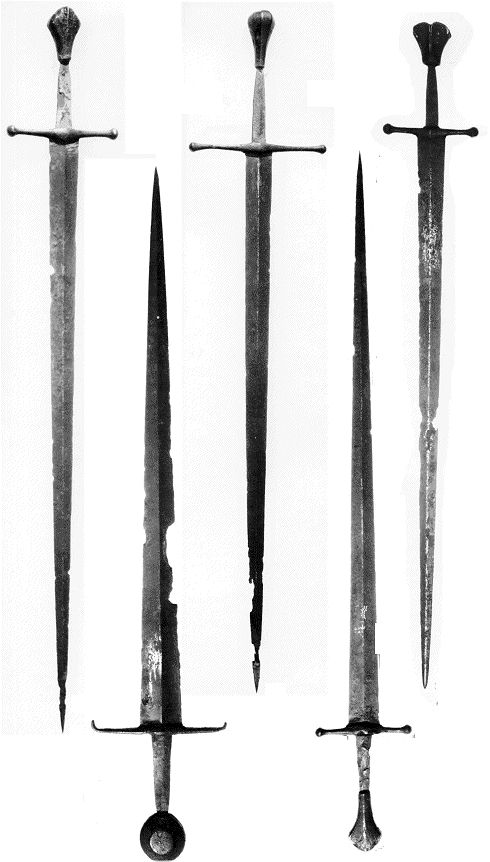 four different types of swords are shown in black and white