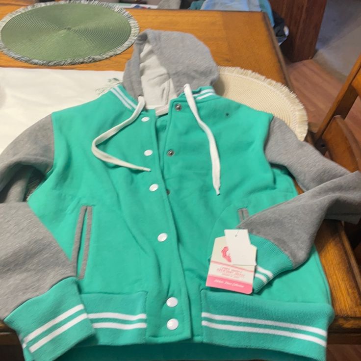 Nwt Ladies Varsity Sweatshirt Jacket Green White And Grey Size Medium College Fleece Hoodie Outerwear, Hooded Fleece Varsity Jacket For Fall, Fleece Hoodie For College, Casual Green Fleece Jacket For Winter, Casual Green Winter Fleece Jacket, Casual Winter Fleece Varsity Jacket, Casual Green Fleece Jacket For Fall, College Spring Hoodie Outerwear, Winter School Fleece Tops