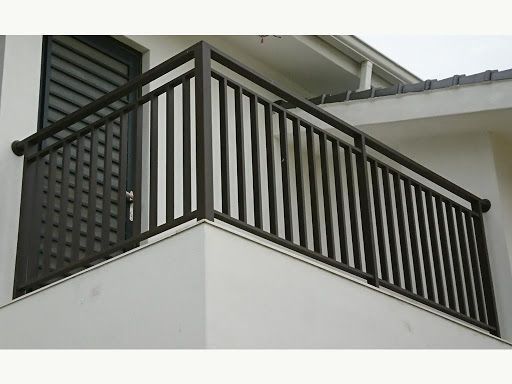 an image of a balcony railing on a house