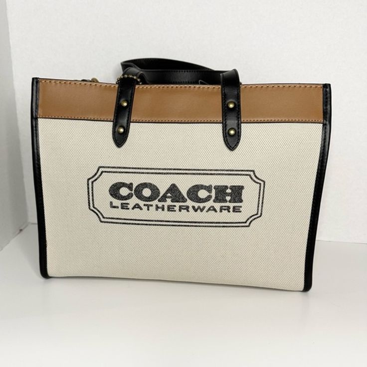 Comes With Dust Bag For Storage. Polished Pebble Leather Inside Zip Pocket Snap Closure, Fabric Lining Handles With 5 1/2" Drop Detachable Strap With 24 1/2" Drop For Shoulder Or Crossbody Wear Four Protective Feet At Base 11 3/4" (L) X 9" (H) X 6" (W) Coach Zip Top Tote, Coach Tote Bags, Grey Tote, Carryall Tote, Polished Pebble, Satchel Tote Bag, Coach Tote, Weekender Tote Bag, Bags Coach