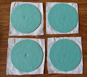 four pieces of paper with blue circles on them