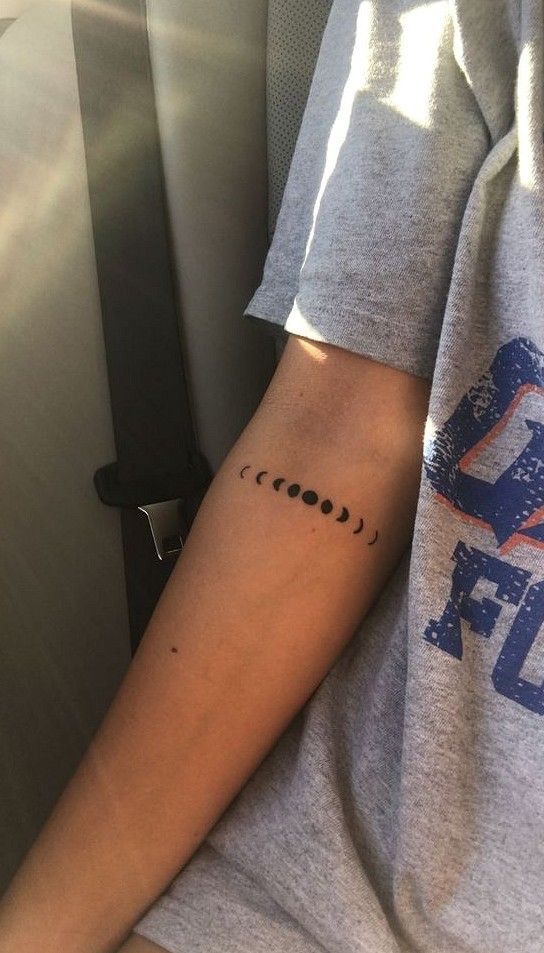 a person with a tattoo on their arm