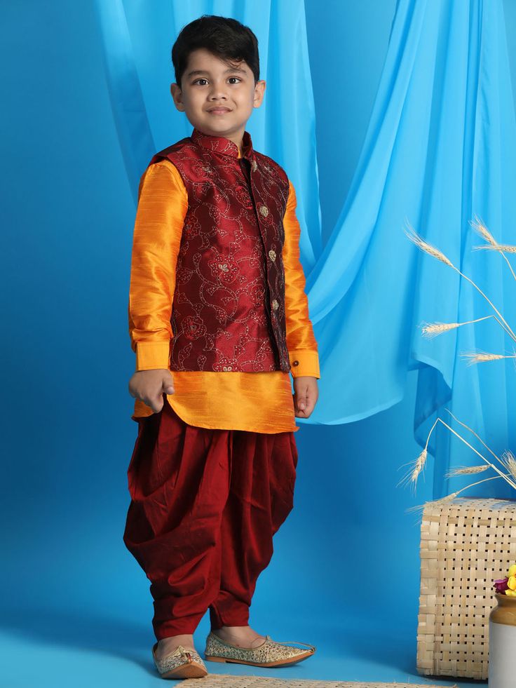 JBN CREATION Boy's Maroon Embroidered Nehru Jacket With Orange Kurta And Maroon Dhoti Set Dress your little one in sophisticated style with this JBN Creation set. Featuring a maroon embroidered Nehru jacket, a vibrant orange kurta, and a matching maroon dhoti, this ensemble is perfect for special occasions and traditional ceremonies. Key Features Maroon embroidered Nehru jacket with mandarin collar Contrasting orange kurta with full sleeves and knee length Maroon dhoti for a complete traditional Festive Nehru Jacket With Resham Embroidery For Navratri, Ceremonial Sherwani With Embroidered Border For Navratri, Long Sleeve Bandhgala With Embroidered Border For Navratri, Bollywood Style Bandhgala With Embroidered Border For Navratri, Bollywood Nehru Jacket With Resham Embroidery For Navratri, Bollywood Style Bandhgala For Festive Occasion, Festive Bollywood Bandhgala With Embroidered Border, Bollywood Style Bandhgala With Embroidered Border For Diwali, Bollywood Bandhgala With Embroidered Border For Diwali