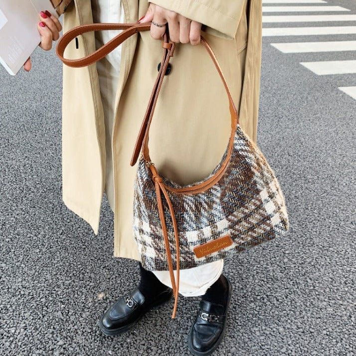 The EMES SHOP bag details a soft tweed material into a baguette bag design. Features a shoulder strap and plaid design.MATERIAL:100% Artificial leather MEASUREMENTS:H" X W"X D" 19cm X 27cm X 12cm 7"in X 10"in X 8"in Plaid Rectangular Bag For Fall, Fall Plaid Rectangular Bag, Fall Season Plaid Rectangular Bag, Fall Plaid Rectangular Shoulder Bag, Trendy Fall Shoulder Bag With Single Strap, Fall Single Strap Shoulder Bag For Daily Use, Plaid Bags For Everyday Use In Fall, Daily Use Shoulder Bag With Houndstooth Pattern For Fall, Trendy Fall Hobo Bag With Single Shoulder Strap