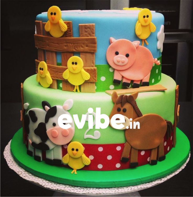 a birthday cake with farm animals on it