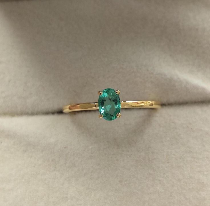 Dainty Emerald Oval Ring Prong Set in 14k Yellow Gold Eye Clean Natural Emerald Ring for Her Birthday Gift for Daughter/Sister/Niece Main Stone : Natural Emerald Origin : Zambian Clarity : Eye Clean(very Rare in Natural Emeralds) Size of Emerald : 6×4mm Ct Weight : 0.55cts. "No Enhancement No Oil Emerald" Emerald can also be Certified upon Request. This dainty oval emerald ring is a timeless piece of jewelry, designed for elegance and charm. The centerpiece is a 6x4mm natural Zambian emerald, we Heirloom Oval Emerald Ring Birthstone, Heirloom Oval Emerald Birthstone Ring, 14k Gold Oval Cabochon Birthstone Ring For Gift, 14k Gold Oval Cabochon Birthstone Ring, 14k Gold Oval Cabochon Emerald Ring Gift, Dainty Oval Emerald Ring For Anniversary, Dainty Oval Solitaire Birthstone Ring, Dainty Oval Solitaire Emerald Ring, Dainty Oval Emerald Ring Gift