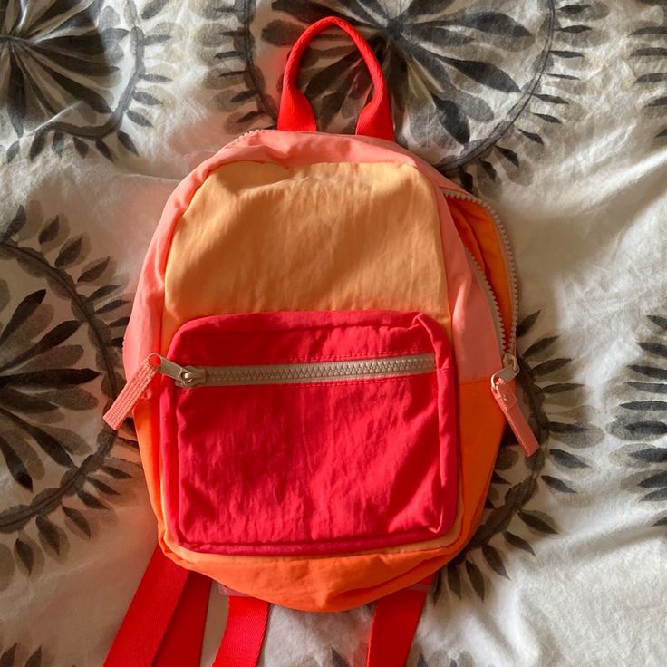 New Without Tags In Perfect Condition. Kids Mini Backpack, But Can Also Fit A Petite Adult. Red Student Backpack For End Of School Year, Playful Red Backpack For Everyday Use, Playful Red Bag For Back To School, Red Backpack For Travel And End Of School Year, Playful Red Standard Backpack, Playful Red School Bag, Red School Backpack With Zipper Closure, Red Nylon Backpack For School, Red Nylon School Backpack