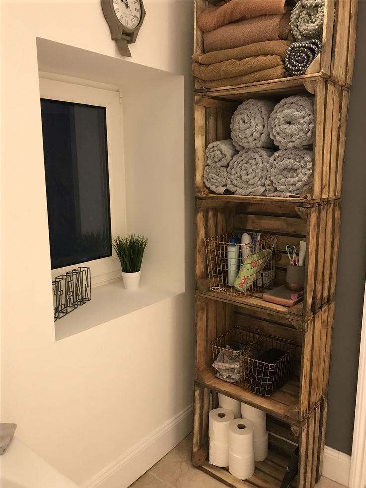 the bathroom is clean and ready to be used as a storage area for toiletries