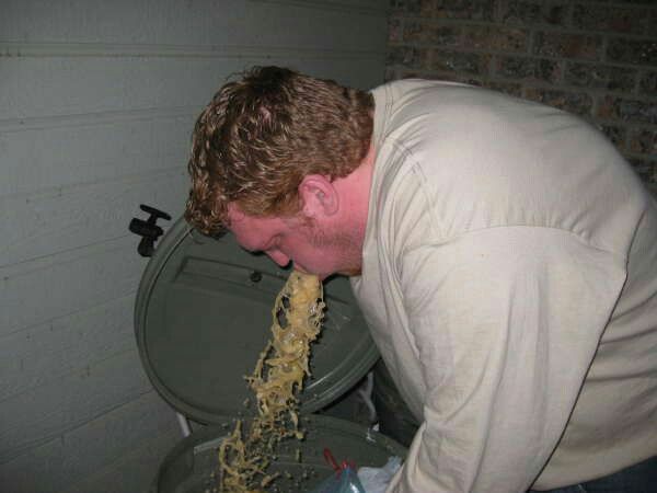 a man is eating noodles out of a toilet