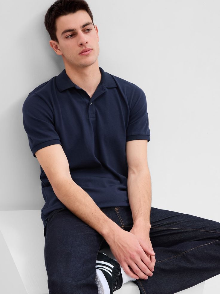 Stretch Pique Polo Shirt | Gap Factory Classic Polo Collar T-shirt With Button-up, Classic Polo Collar T-shirt With Button Closure, Casual Collared T-shirt For Work, Navy Casual Top With Collared Neckline, Casual Short Sleeve Polo Shirt With Buttons, Navy Polo Collar Top With Buttons, Cotton Polo Shirt With Ribbed Collar And Button-up Design, Cotton Polo Shirt With Ribbed Collar And Button-up Front, Casual Solid Color Polo Shirt For Everyday