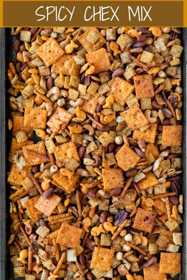 a tray filled with chex mix and the words spicy chex mix on it