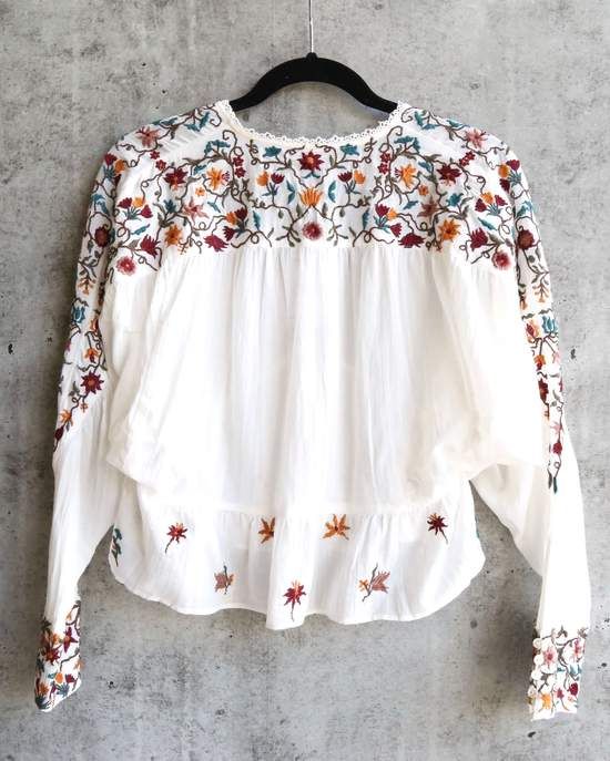 Free People Ava Embroidery Blouse - Ivory - shophearts Cotton Long Sleeve Blouse With Floral Embroidery, Long Sleeve Tops With Floral Embroidery For Summer, Spring Long Sleeve Tops With Chikankari Embroidery, Summer Long Sleeve Embroidered Top With Floral Print, Spring Long Sleeve Tops With Embroidered Sleeves, Summer Long Sleeve Floral Embroidered Top, Long Sleeve Tops With Geometric Embroidery For Summer, Cotton Tops With Chikankari Embroidery For Fall, Fall Cotton Tops With Chikankari Embroidery