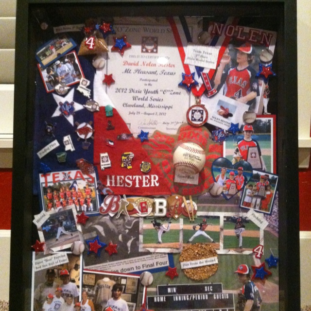 a collage of baseball memorabilia is displayed in a black frame with red, white and blue decorations