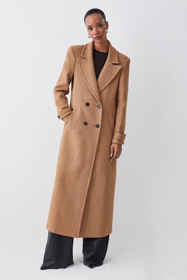 Crafted With Sumptuous Italian Wool, This Longline Coat Adds A Layer Of Sophistication To Every Ensemble. Notched Lapels Give Classic Appeal, While Double-Breasted Buttons And Side Pockets Provide Functionality.Style: Coatfabric: Woollength: Longlineneckline: Collaredsleeve Length: Long Sleeve Timeless Long Wool Coat With Button Closure, Long Wool Coat With Double Button Closure For Fall, Fall Double-breasted Notch Lapel Wool Coat, Fall Long Wool Coat With Double Button Closure, Timeless Long Pea Coat With Double Button Closure, Fall Double-breasted Wool Coat With Double Button, Classic Long Outerwear With Double Button Closure, Timeless Long Coat With Buttons, Chic Long Outerwear With Double Button Closure