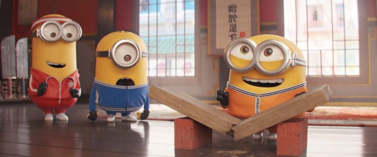 three minion characters standing in front of each other