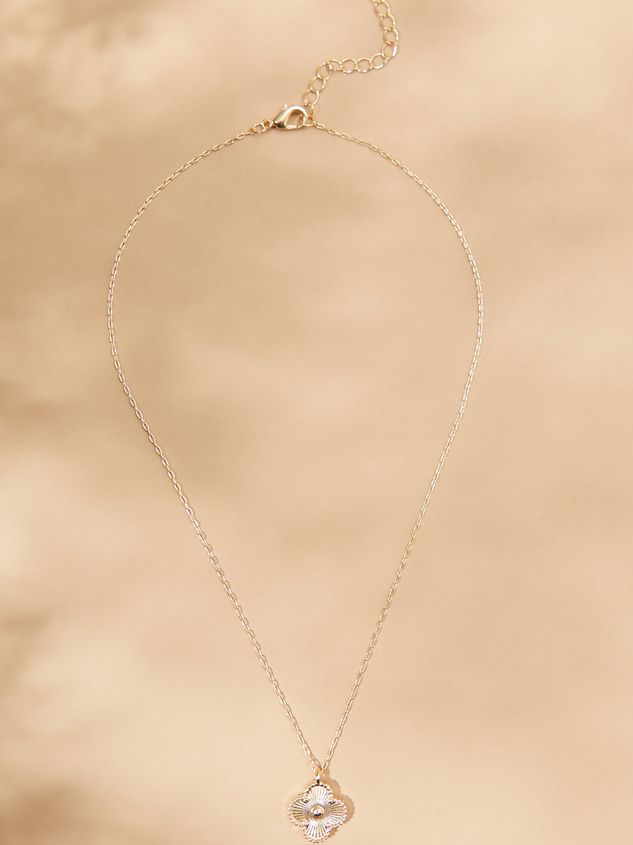 Embrace a touch of magic with this versatile necklace. A delicate clover charm adorns this necklace ensuring it complements any outfit while bringing flair to your look. Dainty Pendant Locket Necklace, Dainty Locket Necklace With Delicate Chain, Elegant Heart Pendant Jewelry With Flower Charm, Dainty Pearl Pendant Necklace With Initial, Delicate Clavicle Chain Pendant Necklace, Delicate Initial Pendant Necklace With Chain, Elegant Flower Pendant Locket Necklace, Delicate Heart Pendant Charm Necklace With Adjustable Chain, Elegant Flower Pendant Charm Necklaces