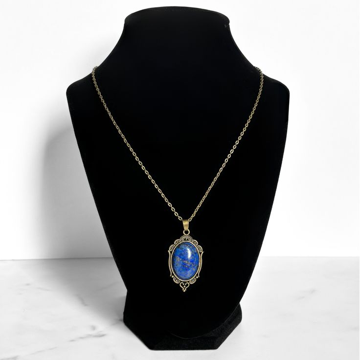 Lapis Lazuli Pendant Necklace | Antique Silver or Gold | 24" Chain Higher Knowledge + Third Eye + Psychic Abilities + Transformation Carry your intentions wherever you go with a handmade Lapis Lazuli pendant necklace. Each pendant is custom made with an antique gold or silver filigree base and comes with an 24" chain with lobster clasp fastening. Known as the "Wisdom Stone" and said to contain the soul of the gods, Lapis Lazuli has been favored by royals, artists, and magical practitioners throu Chain Necklace With Large Oval Pendant For Gift, Oval Pendant Chain Necklace For Gifts, Oval Pendant Chain Necklace Perfect For Gifts, Gold Lapis Lazuli Necklace As A Gift, Gold Lapis Lazuli Necklace For Gift, Blue Oval Pendant Necklace With Spiritual Style, Lapis Lazuli Pendant Necklace For Gift, Handmade Lapis Lazuli Necklace Gift, Spiritual Brass Chain Necklace Gift