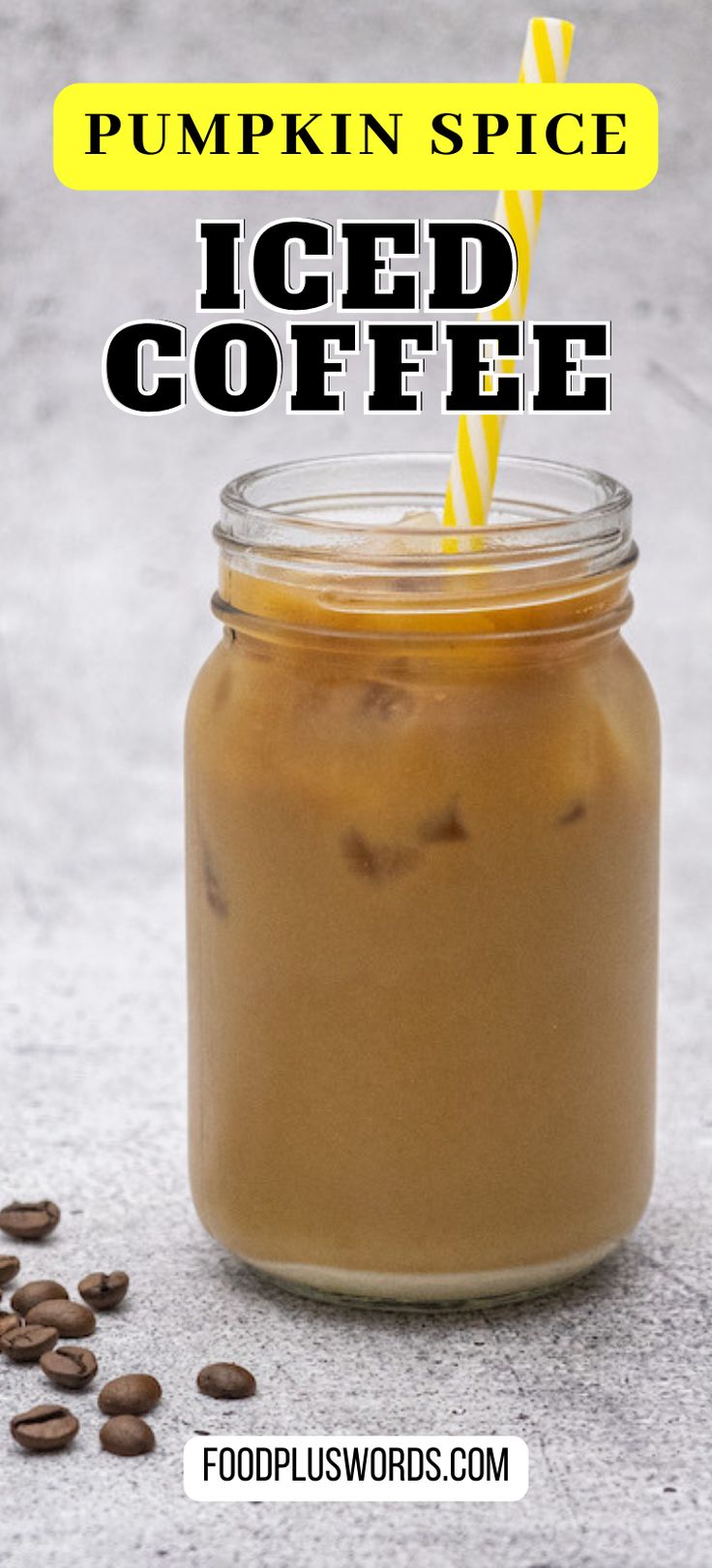 pumpkin spice iced coffee in a mason jar with text overlay reading pumpkin spice iced coffee