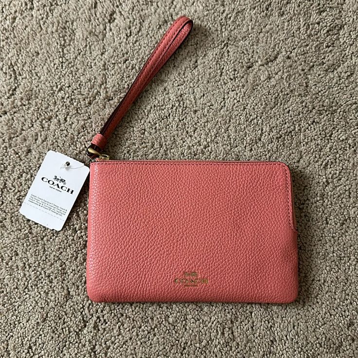 Brand New Peach/Pink Wallet With Tags Never Used. Still Has Tissue In. Coach Pink Wallets For Travel, Pink Coach Wallet For Travel, Coach Pink Wallets For Everyday Use, Pink Pouch Wallet For Everyday, Everyday Pink Pouch Wallet, Pink Everyday Pouch Wallet, Everyday Pink Clutch Wallet, Coach Pink Wallet With Removable Pouch, Coach Pink Clutch For Everyday Use