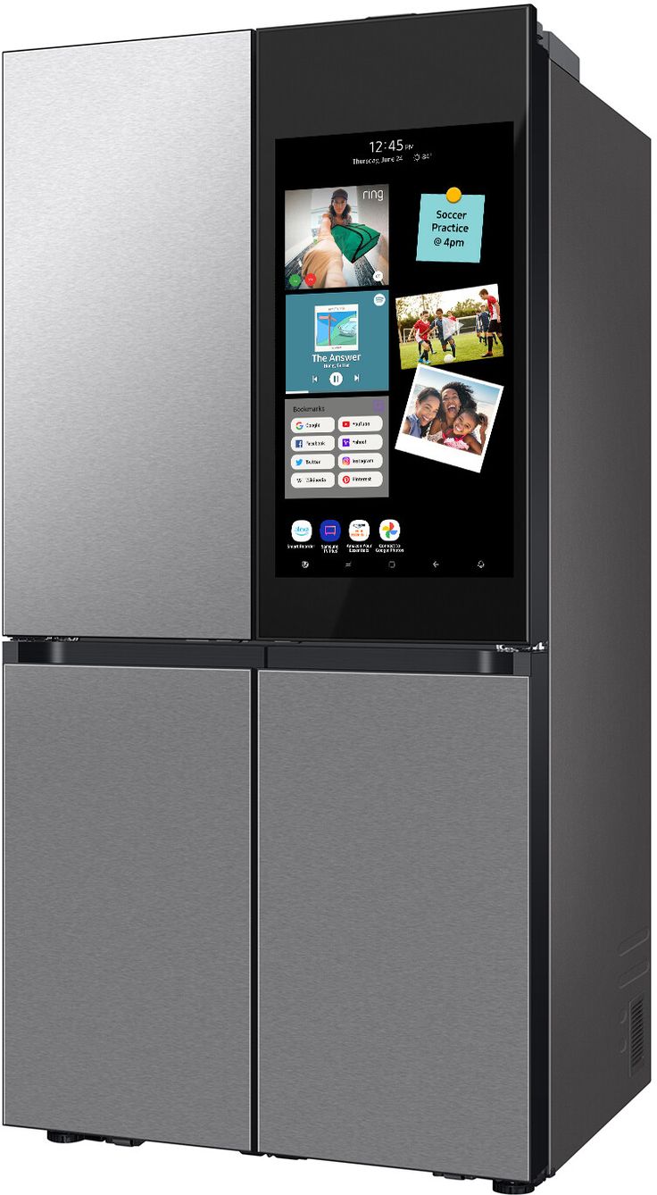 a silver refrigerator freezer sitting in front of a white background