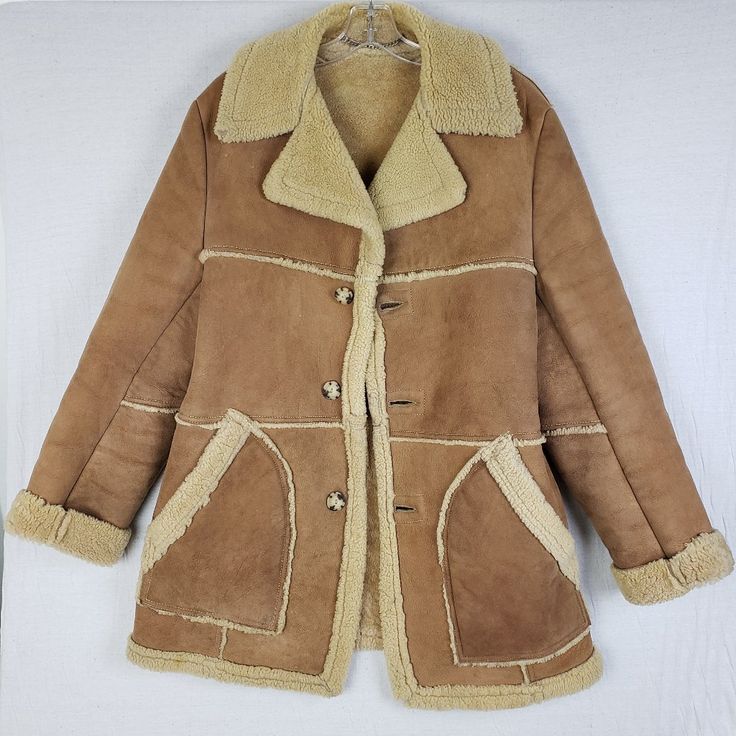 Vintage Marlboro Man Ranch Western Style Sherpa Shearling Coat By Lakeland Size 40 = Approx. Men's Medium Or Women's Large Made By Lakeland, Which Makes Fine Quality Jackets. Classic Ranch Style Jacket Made Famous In The Marlboro Man Advertising. The Coat Is A 40 Regular And Clearly Marked On Left Lower Inside. Has The Chain Hang Up Hook. The Coat Lining Is In Excellent Condition. The Exterior Has A Few Light Scuffs/Marks As Shown In Photos And Expected For A Jacket Of This Age. Most Likely From Vintage Shearling Coat, Retro Long Sleeve Winter Fur Coat, Retro Long Sleeve Fur Coat For Winter, Winter Lambswool Outerwear With Faux Fur Lining, Vintage Outerwear With Faux Fur Lining And Long Sleeves, Vintage Winter Shearling Outerwear, Sheepskin Outerwear With Fleece Lining And Long Sleeves, Sheepskin Outerwear With Fleece Lining, Vintage Brown Shearling Outerwear