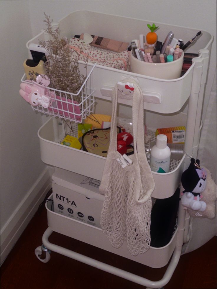 a white cart filled with lots of items