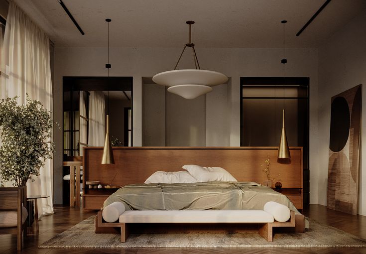 a large bed sitting inside of a bedroom on top of a hard wood floor