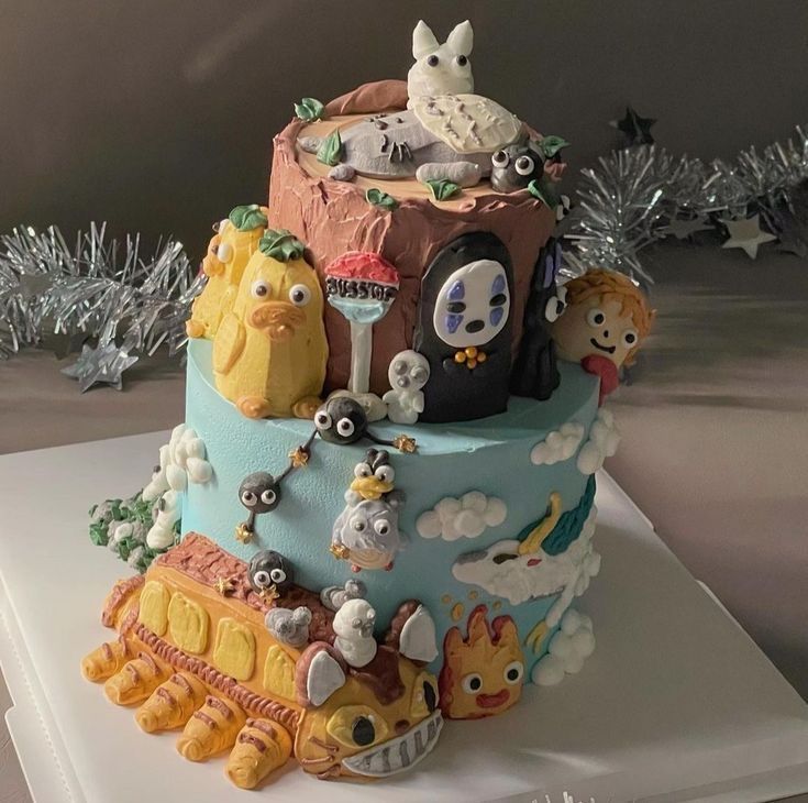 a cake decorated with cartoon characters on it