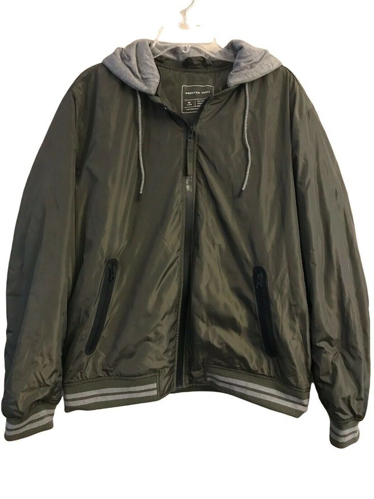 New bomber jacket available with a removeable hood. Two front pockets with zipper closures. All prices are firm. No consideration will be given to offers. Sporty Hooded Parka With Zipper Closure, Outdoor Hooded Jacket With Zip Fly, Weatherproof Hooded Track Jacket For Winter, Sporty Hooded Outerwear With Zipper Closure, Hooded Windbreaker With Zip Fly For Outdoor Activities, Urban Hooded Parka With Zipper Closure, Green Jacket Men, American Eagle Men, Jacket With Hood