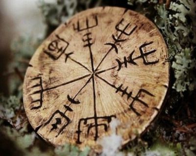 a tree slice with writing on it