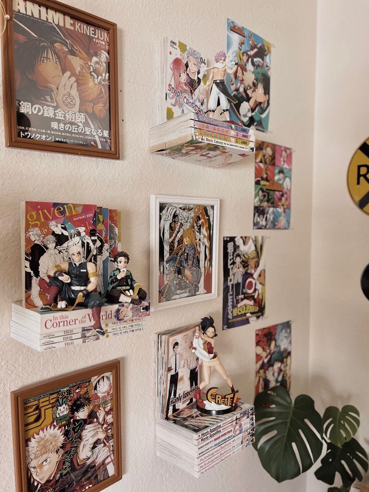 many anime posters are hanging on the wall next to a potted plant and some books