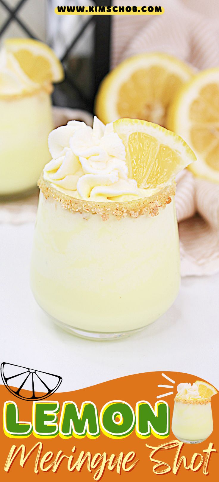 lemon meringue shot with whipped cream and sliced lemons