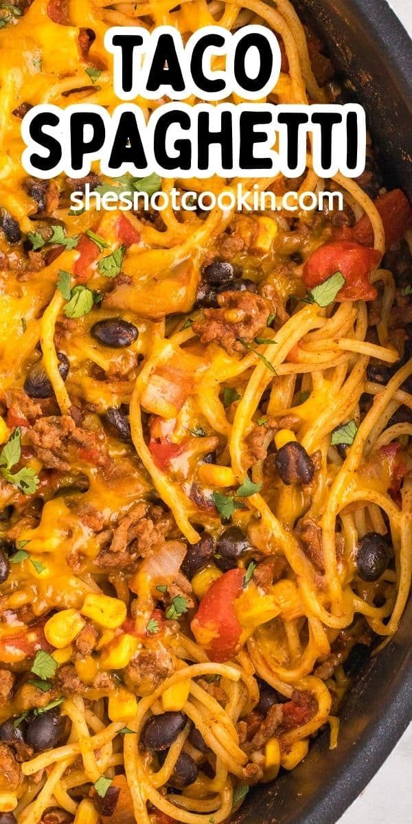 a skillet filled with taco spaghetti and black beans