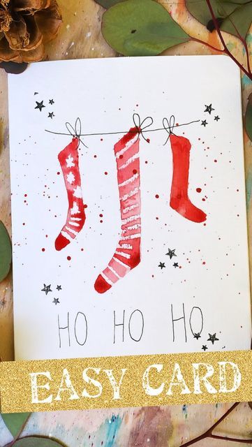 a christmas card with stockings and stars on it