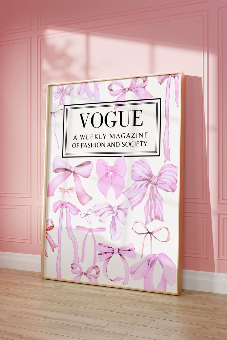 a magazine cover with pink flowers on it in front of a pink wall and wooden floor