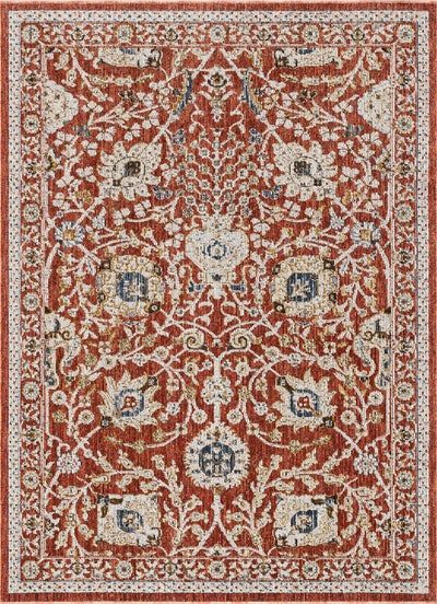 an orange and white rug with ornate designs on the bottom, in various colors and sizes