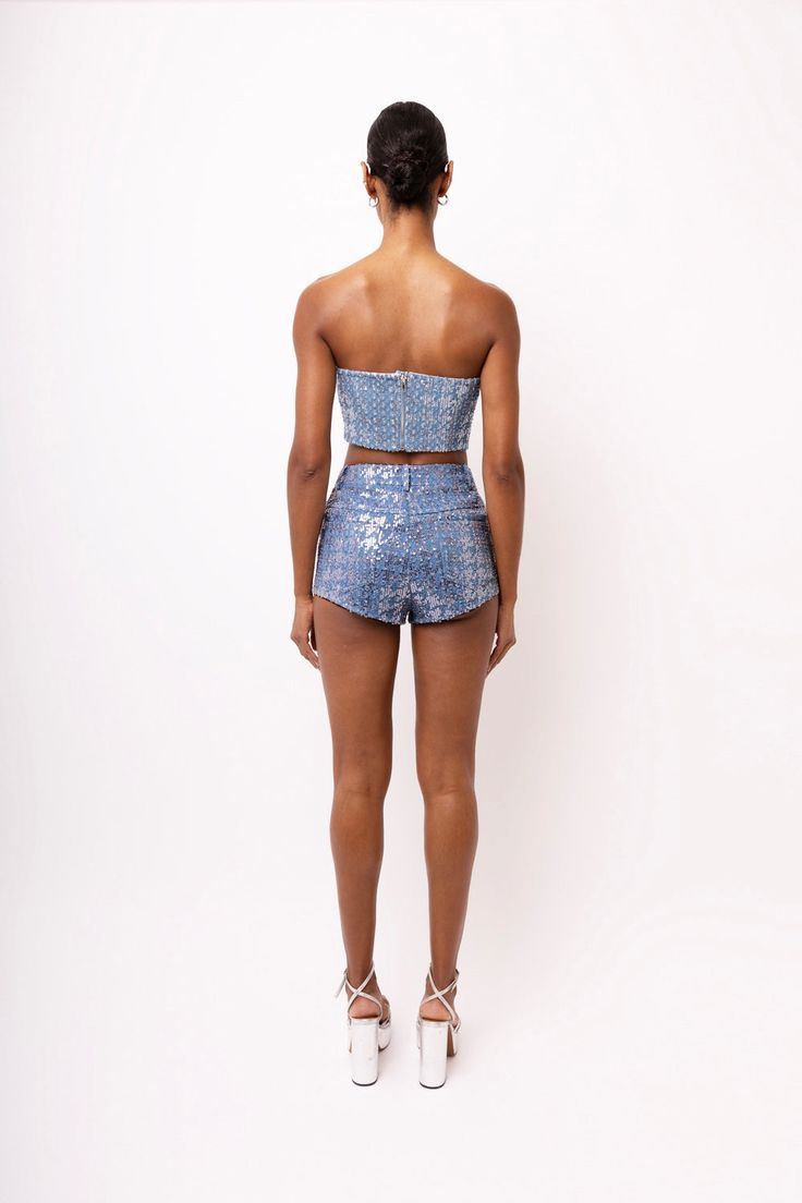 Sequin embellished hotpant shorts.  Classic blue wash.  High rise.  Five pockets.  Front fly fastening. Pair with our Theo Denim Cropped Sequin Top﻿ 70% Cotton, 30% Polyester. Lining: 100% Cotton. Cool hand wash only. Metallic Trousers, Curved Neckline, Spring Wedding Guest, Sequin Embellishment, Sequin Shorts, Pearl Jewellery Earrings, Halterneck Dress, Pink Sequin, Pink Mini Dresses