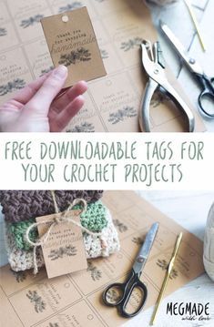 there is a hand holding a tag that says free printable tags for your crochet projects