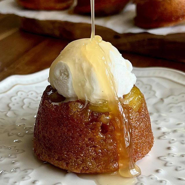 a dessert is being drizzled with ice cream