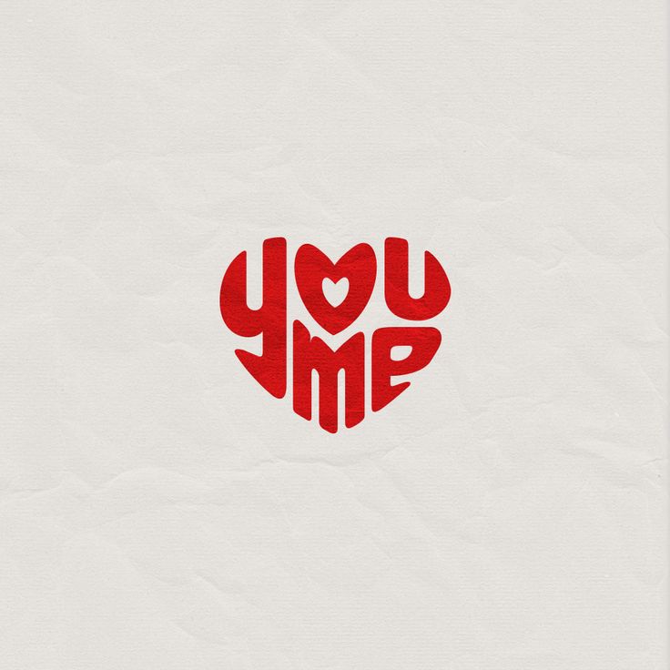 the word you me is written in red on white paper with a heart shaped shape