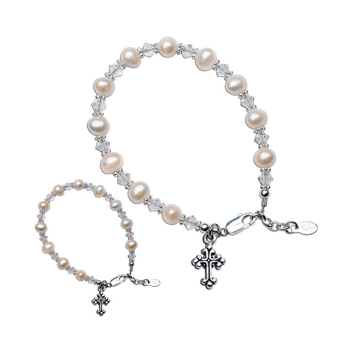 "This is a timeless keepsake bracelet set designed and hand-beaded in the USA.  This is made using only the finest materials such as 100% sterling silver components, freshwater pearls, high-end crystals, sparkling silver accents, and intricate cross charms.  This makes a treasured gift for mother and daughter with a reminder of the special bond they share.  This comes in a beautiful  gift box and makes a great Mother's Day Gift!  Mother's bracelet measures 7 - 7.5\" and all bracelets have adjust Classic Adjustable Jewelry For First Communion, Adjustable Pearl Bracelets For Baptism, Elegant Adjustable Beaded Bracelets For Baptism, Elegant Beaded Jewelry For Baptism, Adjustable Pearl Bracelet With Round Beads For First Communion, Adjustable Round Beads Jewelry For First Communion, Adjustable Rosary Bracelet With Round Beads For Baptism, Adjustable 8mm Beads Rosary Bracelet For Baptism, Adjustable Rosary Bracelet With Round Beads For First Communion