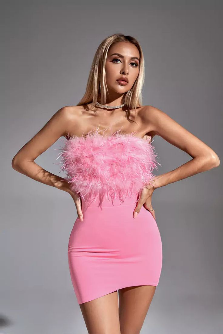 Our Annabelle Pink Feather Dress is sure to wow the crowd at your next special event! It's made from pink polyester and features an off-the-shoulder chic bodice and fitted skirt. Feathers adorn her neckline, adding a unique allure to the little dress. Simply complete the look with heels!  Dress Length: Approx 72cm Materials: Polyester Gentle Dry Clean Only  The model is 5 ft 7 and wears size S  Color may vary due to lighting on images. The product images (without a model) are closest to the true Pink Feather Dress, Glitter Wedding Dress, Heels Dress, Bandage Midi Dress, Pink Feathers, Floral Shirt Dress, Feather Dress, The Plaza, Puff Sleeve Dresses