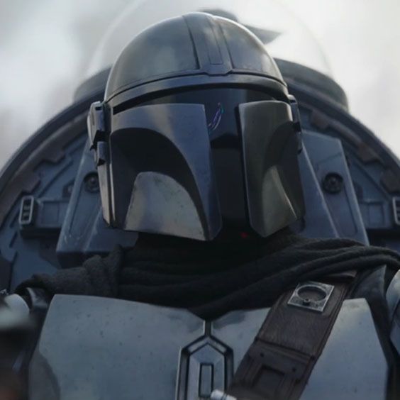 boba fett from star wars is wearing a helmet