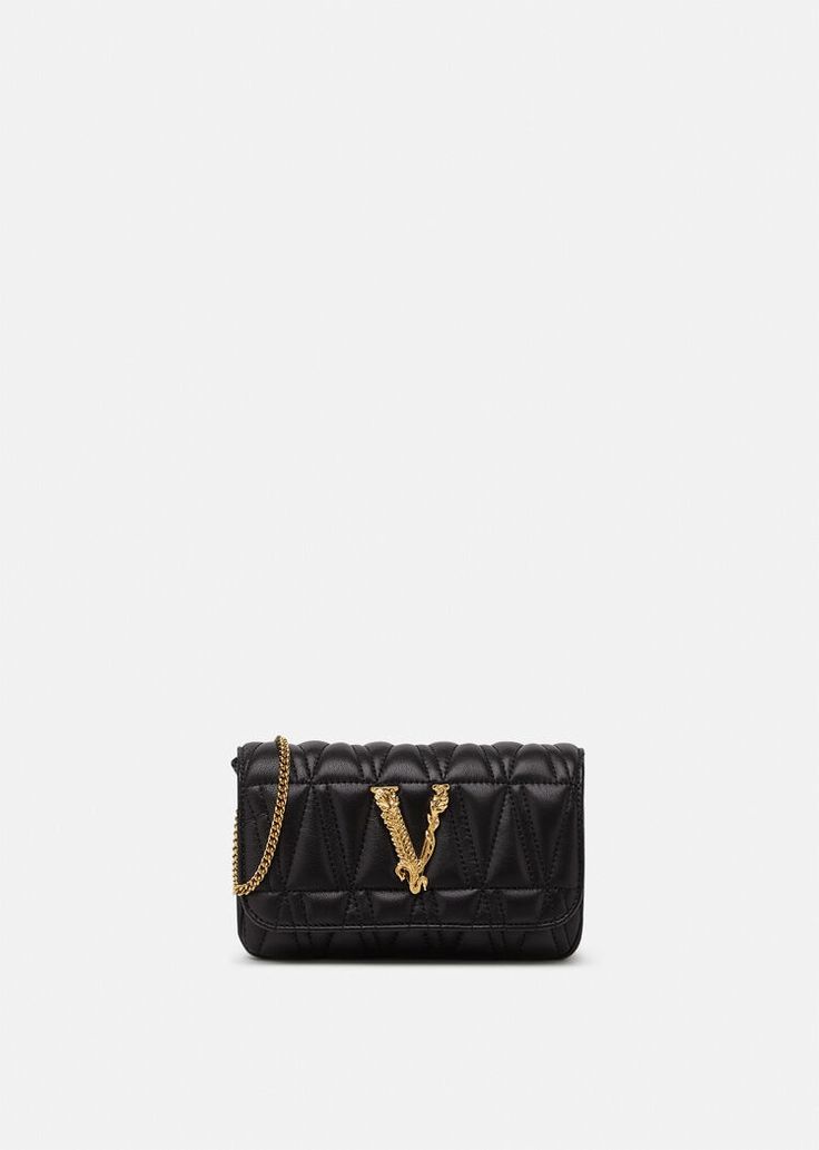 Crafted from Italian leather quilted in a V-pattern, the Virtus mini bag features Barocco V hardware with a magnetic flap closure, complete with a shoulder chain strap, flat internal card slots and Barocco printed lining. Versace Style, Versace Home, Designer Clutch, Shoulder Chain, Gianni Versace, Mini Bags, Mini Fashion, Leather Pouch, Pouch Bag