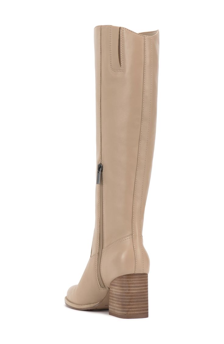 Smooth, polished leather forms the upper of this knee-high boot set atop a slightly curved block heel. 2 3/4" heel 15 1/4" shaft; 14 1/2" regular calf circumference 15 1/4" shaft; 16" wide calf circumference 15 1/4" shaft; 17" extra-wide calf circumference Leather upper/synthetic lining/rubber sole Imported Medium Width Leather Knee-high Boots, Tall Leather Knee-high Boots, Leather Knee-high Boots With Medium Width, Leather Knee-high Boots With Stacked Heel, Wide Calf Leather Knee-high Boots, Wide Calf Faux Leather Knee-high Boots With Almond Toe, Classic Knee-high Faux Leather Boots, Knee-high Heeled Boots With Leather Lining, Flat Platform Sandals